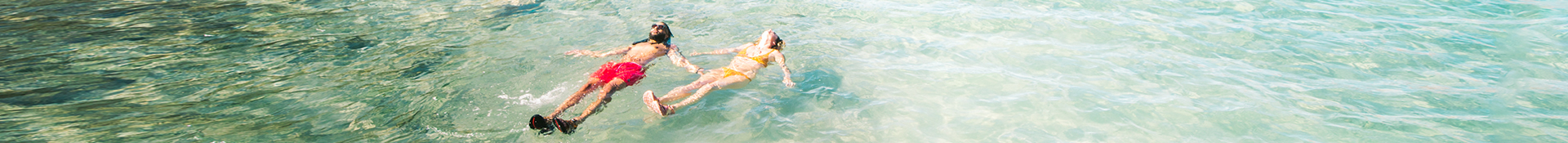 People lounging in the water