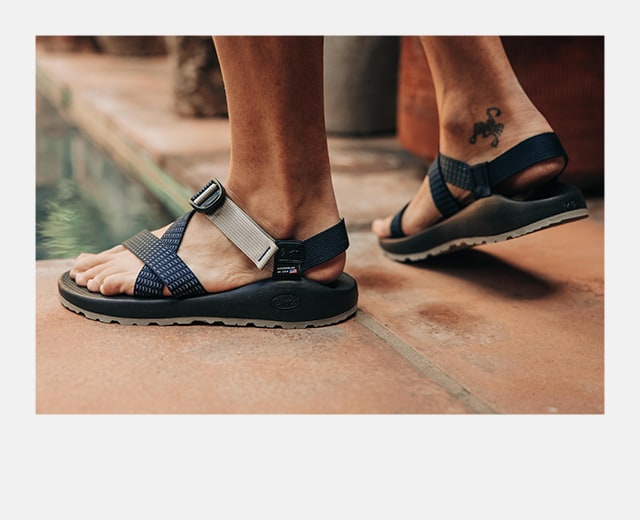  A person walking in the Taylor Stitch sandal.