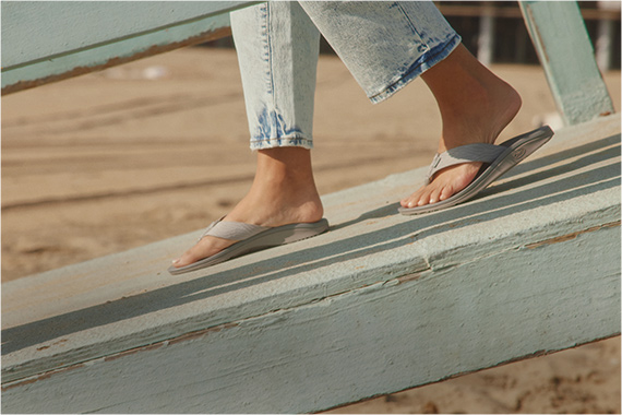 Walking down a ramp to the beach.