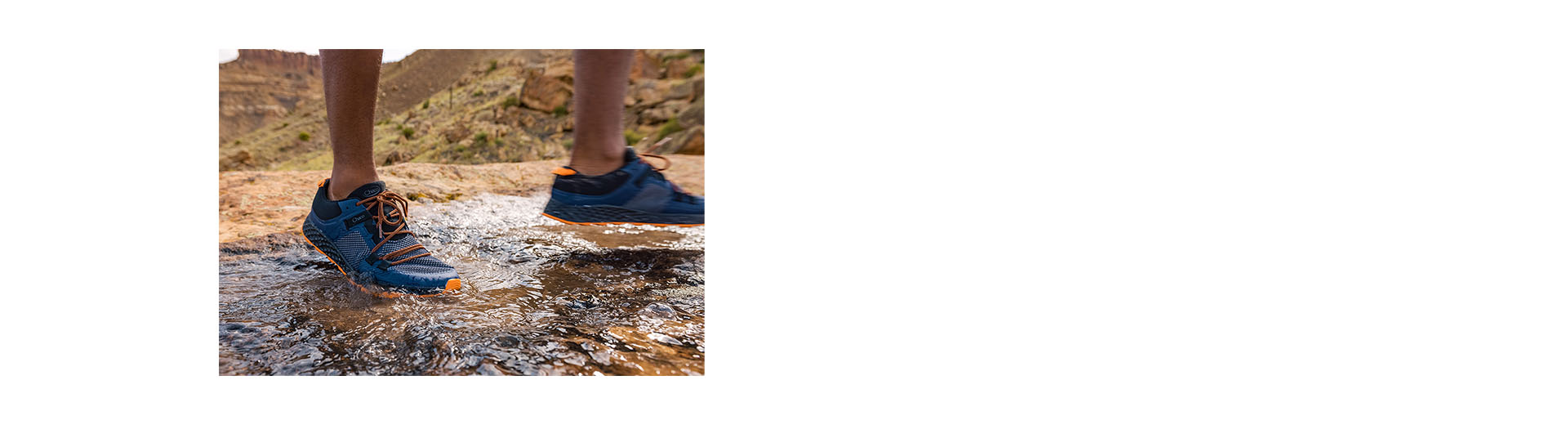 Chaco Canyonland sneakers outside stepping through a puddle.