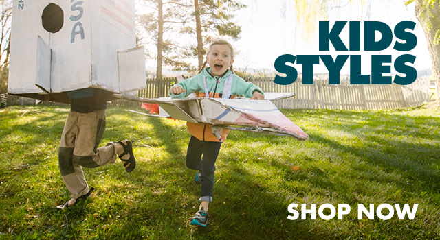 Kid playing outside wearing Chaco sandals