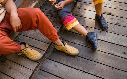 Two people hanging on the deck.