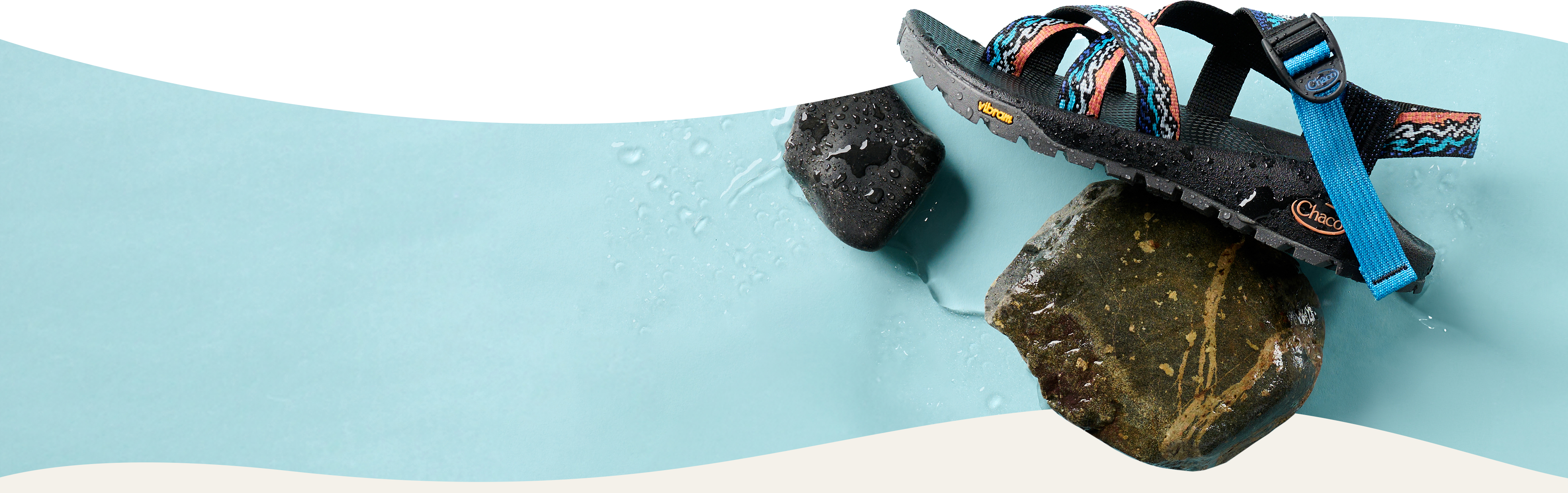 Rapid Pro Chacos on a wet rock.